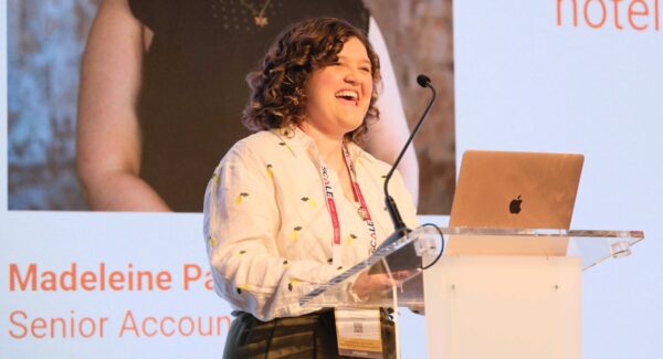 Madeleine Parkin speaking at short term rental technology event